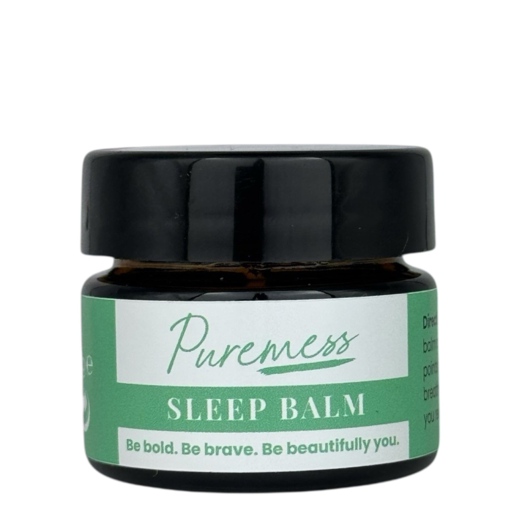 Dark amber glass container with black lid featuring Puremess Sleep Balm label in green and white, handmade in the UK with. - Sleep Balm - PUREMESS SKINCARE