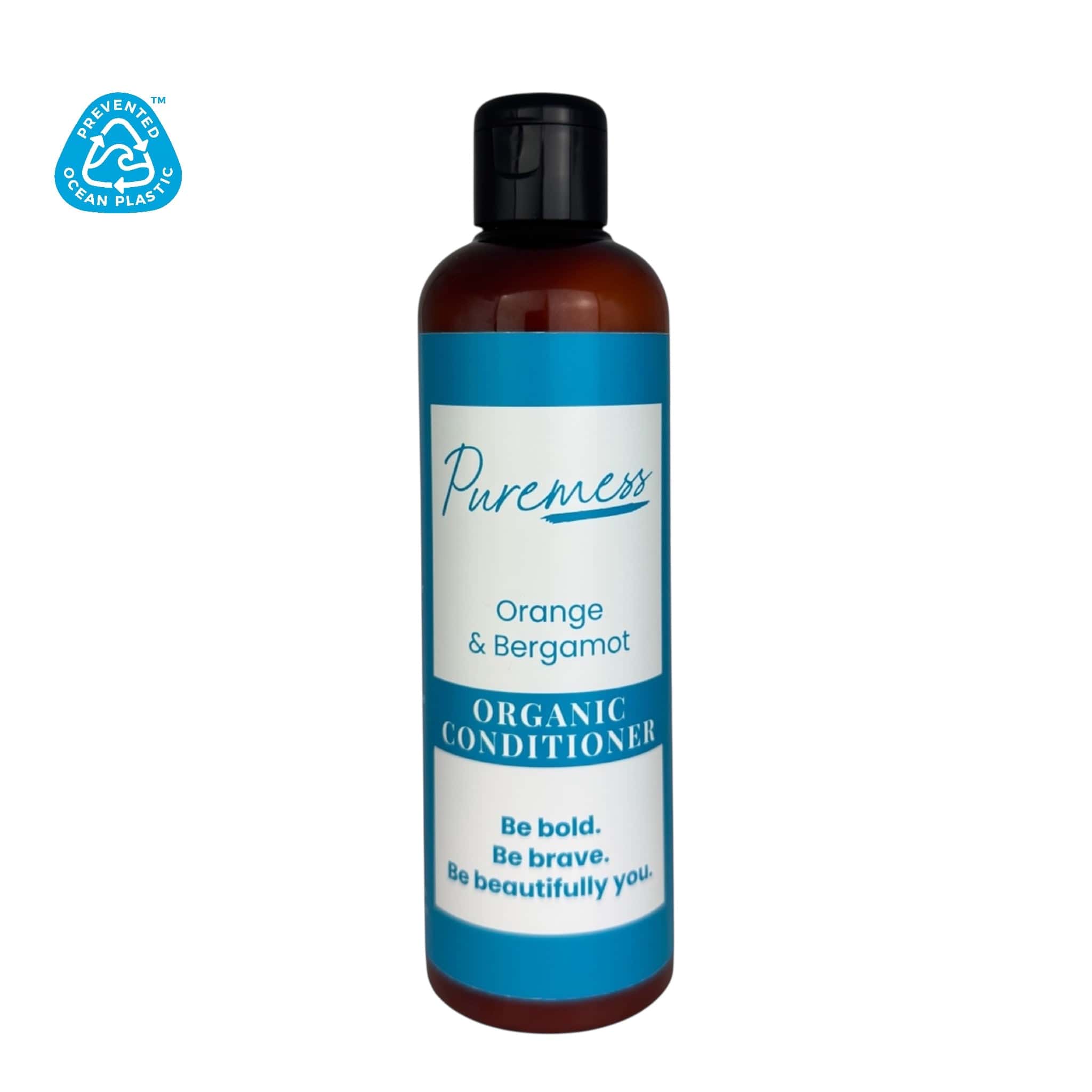 Brown plastic bottle of Pureness Orange & Bergamot organic conditioner with blue and white label and black flip cap. - Orange & Bergamot Organic Conditioner