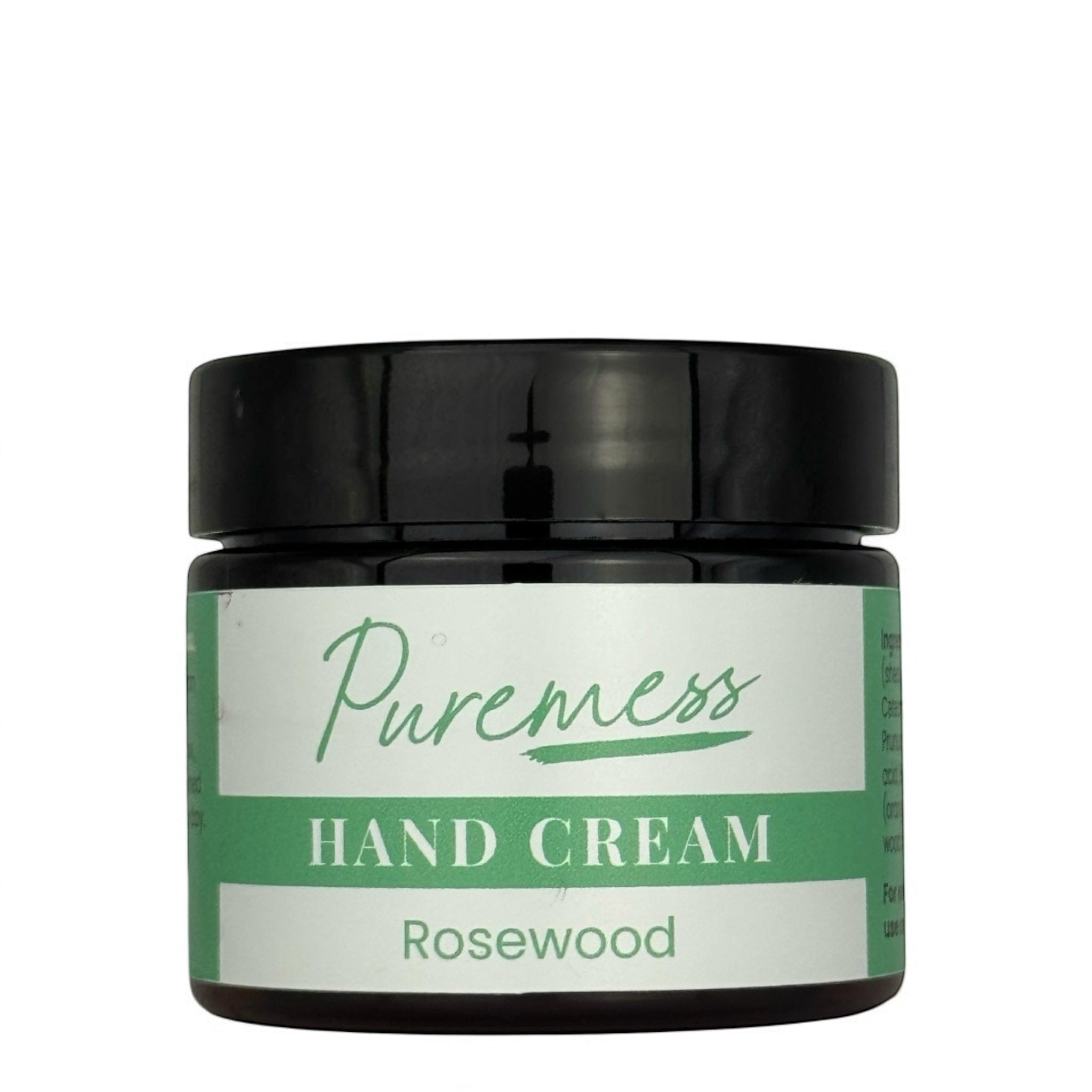 Small dark amber glass jar with black screw lid, labeled Puremess Hand Cream Rosewood in green and white. - Hand Cream Rosewood 50g